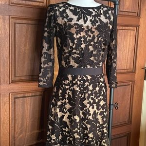 Tadashi Shoji Cocktail dress, Black laser cut out, nude liner.